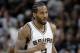 Houston Rockets' Patrick Beverley (2) jogs up court during the first half of Game 2 in a second-round NBA basketball playoff series against the Houston Rockets on Wednesday, May 3, 2017, in San Antonio. (AP Photo/Eric Gay)