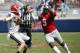 File-This Sept. 24, 2016, file photo shows Mississippi defensive tackle Breeland Speaks (9) rushing Georgia quarterback Jacob Eason (10) into a pass in the second half of their NCAA college football game in Oxford, Miss. The Rebels have outscored opponents 41-6 in the first quarter and 107-33 in the first half. The second-half Rebels improved against Georgia. (AP Photo/Rogelio V. Solis, File)