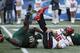 BIRMINGHAM, AL - DECEMBER 23: Deadrin Senat #10 of the South Florida Bulls sacks Nic Shimonek #16 of the Texas Tech Red Raiders in the first half of the Birmingham Bowl at Legion Field on December 23, 2017 in Birmingham, Alabama. (Photo by Joe Robbins/Getty Images)