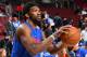 PHILADELPHIA, PA - APRIL 16: Joel Embiid #21 of the Philadelphia 76ers warms up prior to Game Two of Round One of the 2018 NBA Playoffs against the Miami Heat on April 16, 2018 in Philadelphia, Pennsylvania NOTE TO USER: User expressly acknowledges and agrees that, by downloading and/or using this Photograph, user is consenting to the terms and conditions of the Getty Images License Agreement. Mandatory Copyright Notice: Copyright 2018 NBAE (Photo by Jesse D. Garrabrant/NBAE via Getty Images)