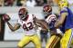 Southern California's Uchenna Nwosu, left, celebrates with Christian Rector after recovering a California fumble during the second half of an NCAA college football game Saturday, Sept. 23, 2017, in Berkeley, Calif. (AP Photo/Ben Margot)