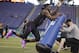 Tulane defensive lineman Ade Aruna runs a drill at the NFL football scouting combine in Indianapolis, Sunday, March 4, 2018. (AP Photo/Michael Conroy)