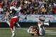 North Carolina State running back Nyheim Hines (7) eludes Arizona State defensive back J'Marcus Rhodes (17) to pick up a first down during the first half of the Sun Bowl NCAA college football game in El Paso, Texas, Friday, Dec. 29, 2017. (AP Photo/Andres Leighton)