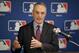 FILE - In this Feb. 1, 2018 file photo Major League Baseball commissioner Rob Manfred speaks during a news conference at the baseball owners meetings in the Four Seasons Hotel in Los Angeles. Rebuilding _ or, to use the less euphemistic term, tanking _ has become one of baseball’s most polarizing topics in 2018. Manfred has said