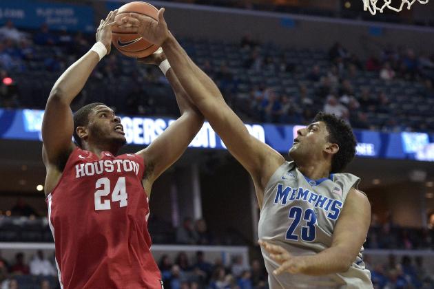 Houston forward Breaon Brady (24) shoots against Memphis forward Karim Sameh Azab (23) in the first half of an NCAA college basketball game Thursday, Feb. 22, 2018, in Memphis, Tenn. (AP Photo/Brandon Dill)