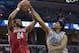 Houston forward Breaon Brady (24) shoots against Memphis forward Karim Sameh Azab (23) in the first half of an NCAA college basketball game Thursday, Feb. 22, 2018, in Memphis, Tenn. (AP Photo/Brandon Dill)