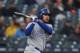 Kansas City Royals' Mike Moustakas bats against the Detroit Tigers in the third inning of a baseball game in Detroit, Friday, April 20, 2018. (AP Photo/Paul Sancya)