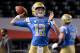 PHOENIX, AZ - DECEMBER 26: Quarterback Austin Burton #12 of the UCLA Bruins throws the football prior to the Cactus Bowl against Kansas State Wildcats at Chase Field on December 26, 2017 in Phoenix, Arizona. The Kansas State Wildcats won 35-17. (Photo by Jennifer Stewart/Getty Images)