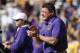 LSU head coach Ed Orgeron walks on the field before an NCAA college football game against Arkansas in Baton Rouge, La., Saturday, Nov. 11, 2017. (AP Photo/Gerald Herbert)