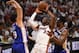 MIAMI, FL - APRIL 21: Dwyane Wade #3 of the Miami Heat attempts to drive to the basket as he is surrounded by Dario Saric #9 and Joel Embiid #21 of the Philadelphia 76ers in the fourth quarter during Game Four of Round One of the 2018 NBA Playoffs at American Airlines Arena on April 21, 2018 in Miami, Florida. NOTE TO USER: User expressly acknowledges and agrees that, by downloading and or using this photograph, User is consenting to the terms and conditions of the Getty Images License Agreement. (Photo by Mark Brown/Getty Images)