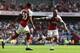 LONDON, ENGLAND - APRIL 22: Alexandre Lacazette of Arsenal celebrates scoring his side's fourth goal with Ainsley Maitland-Niles during the Premier League match between Arsenal and West Ham United at Emirates Stadium on April 22, 2018 in London, England. (Photo by Shaun Botterill/Getty Images)