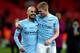 LONDON, ENGLAND - FEBRUARY 25: David Silva and Kevin De Bruyne of Manchester City celebrate after the Carabao Cup Final between Arsenal and Manchester City at Wembley Stadium on February 25, 2018 in London, England. (Photo by Catherine Ivill/Getty Images)