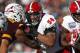 North Carolina State offensive tackle Will Richardson (54) blocks Arizona State tight end Jay Jay Wilson (9) to prevent a tackle on running back Reggie Gallaspy (25) during the first half of the Sun Bowl NCAA college football game in El Paso, Texas, Friday, Dec. 29, 2017. (AP Photo/Andres Leighton)