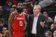 Houston Rockets coach Mike D'Antoni talks to Rockets' guard James Harden (13) against the Minnesota Timberwolves in the second quarter of an NBA basketball game Sunday, March 18, 2018, in Minneapolis. (AP Photo/Andy Clayton-King)