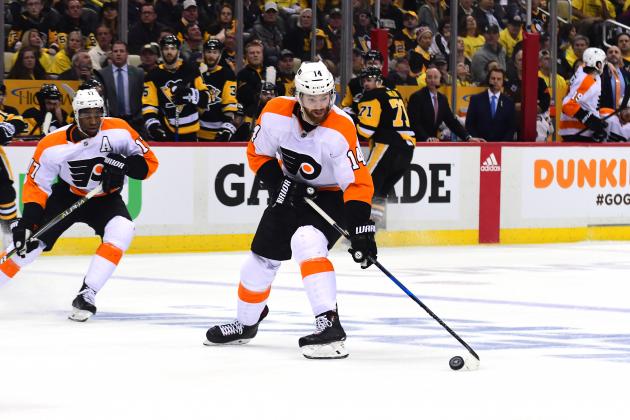 PITTSBURGH, PA - APRIL 20: Sean Couturier #14 of the Philadelphia Flyers skates with the puck against the Pittsburgh Penguins in Game Five of the Eastern Conference First Round during the 2018 NHL Stanley Cup Playoffs at PPG PAINTS Arena on April 20, 2018 in Pittsburgh, Pennsylvania. (Photo by Matt Kincaid/Getty Images)