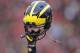 MADISON, WI - NOVEMBER 18: General view as a Michigan Wolverines helmet is held in the air during a game against the Wisconsin Badgers at Camp Randall Stadium on November 18, 2017 in Madison, Wisconsin. Wisconsin won 24-10. (Photo by Joe Robbins/Getty Images) *** Local Caption ***