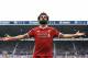 Liverpool's Egyptian midfielder Mohamed Salah celebrates scoring their second goal during the English Premier League football match between West Bromwich Albion and Liverpool at The Hawthorns stadium in West Bromwich, central England, on April 21, 2018. (Photo by Lindsey PARNABY / AFP) / RESTRICTED TO EDITORIAL USE. No use with unauthorized audio, video, data, fixture lists, club/league logos or 'live' services. Online in-match use limited to 75 images, no video emulation. No use in betting, games or single club/league/player publications. / (Photo credit should read LINDSEY PARNABY/AFP/Getty Images)