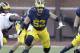 Michigan offensive lineman Mason Cole (52) defends the line during the second half of an NCAA college football game against Illinois, Saturday, Oct. 22, 2016 in Ann Arbor, Mich. (AP Photo/Carlos Osorio)