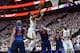 SALT LAKE CITY, UT - APRIL 23: Donovan Mitchell #45 of the Utah Jazz goes to the basket past Carmelo Anthony #7 of the Oklahoma City Thunder in the first half during Game Four of Round One of the 2018 NBA Playoffs at Vivint Smart Home Arena on April 23, 2018 in Salt Lake City, Utah. NOTE TO USER: User expressly acknowledges and agrees that, by downloading and or using this photograph, User is consenting to the terms and conditions of the Getty Images License Agreement. (Photo by Gene Sweeney Jr./Getty Images)