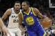 San Antonio Spurs' Rudy Gay (22) defends as Golden State Warriors' Kevin Durant (35) advances the ball up court in the first half of Game 3 of a first-round NBA basketball playoff series in San Antonio, Thursday, April 19, 2018. (AP Photo/Tony Gutierrez)