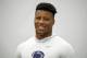 Penn State running back Saquon Barkley waits to be interviewed during Penn State Pro Day in State College, Pa., Tuesday, March 20, 2018. Barkley did not participate in the drills. (AP Photo/Gene J. Puskar)