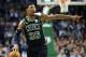 Boston Celtics' Marcus Smart signals during the first quarter of an NBA basketball game against the Indiana Pacers in Boston, Sunday, March 11, 2018. (AP Photo/Michael Dwyer)