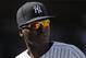 New York Yankees shortstop Didi Gregorius (18) waits for teammates to come off the field at the end of the top of the seventh inning of a baseball game against the Baltimore Orioles, Saturday, April 7, 2018, in New York. (AP Photo/Julie Jacobson)
