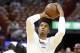 Miami Heat center Hassan Whiteside (21) warms up before play against the Philadelphia 76ers in Game 4 of a first-round NBA basketball playoff series, Saturday, April 21, 2018, in Miami. (AP Photo/Joe Skipper)