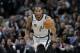 San Antonio Spurs forward Kawhi Leonard (2) moves the ball up court during the second half of an NBA basketball game against the Denver Nuggets, Saturday, Jan. 13, 2018, in San Antonio. San Antonio won 112-80. (AP Photo/Eric Gay)