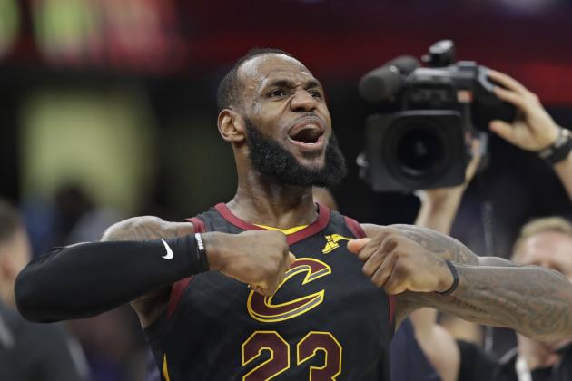 Cleveland Cavaliers' LeBron James celebrates after scoring the game-winning shot in the second half of Game 5 of an NBA basketball first-round playoff series against the Indiana Pacers, Wednesday, April 25, 2018, in Cleveland. The Cavaliers won 98-95. (AP Photo/Tony Dejak)