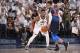 SALT LAKE CITY, UT - APRIL 23: Russell Westbrook #0 of the Oklahoma City Thunder handles the ball against Donovan Mitchell #45 of the Utah Jazz in Game Four of Round One of the 2018 NBA Playoffs on April 23, 2018 at vivint.SmartHome Arena in Salt Lake City, Utah. NOTE TO USER: User expressly acknowledges and agrees that, by downloading and/or using this Photograph, user is consenting to the terms and conditions of the Getty Images License Agreement. Mandatory Copyright Notice: Copyright 2018 NBAE (Photo by Garrett Ellwood/NBAE via Getty Images)