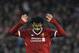Liverpool's Mohamed Salah celebrates after scoring his side's second goal during the Champions League semifinal, first leg, soccer match between Liverpool and Roma at Anfield Stadium, Liverpool, England, Tuesday, April 24, 2018. (AP Photo/Rui Vieira)