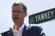 FILE - In this June 22, 2017, file photo, Boston Red Sox president Sam Kennedy addresses a gathering where a portion of Yawkey Way was renamed David Ortiz Drive, to honor the retired Red Sox designated hitter, outside Fenway Park in Boston. Red Sox principal owner John Henry says he wants to take steps to rename all of Yawkey Way, a street that has been an enduring reminder of the franchise's complicated racial past. (AP Photo/Charles Krupa, File)