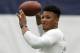 Penn State running back Saquon Barkley, tosses a football during Penn State Pro Day in State College, Pa., Tuesday, March 20, 2018. Barkley did not participate in the drills. (AP Photo/Gene J. Puskar)