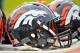 NASHVILLE, TN - DECEMBER 11: A helmet of the Denver Broncos plays rests on a cooler during a game against the Tennessee Titans at Nissan Stadium on December 11, 2016 in Nashville, Tennessee. (Photo by Frederick Breedon/Getty Images)