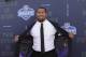 North Carolina State's Bradley Chubb poses for photos on the red carpet before the first round of the NFL football draft, Thursday, April 26, 2018, in Arlington, Texas. (AP Photo/Eric Gay)