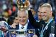 TOPSHOT - Leicester City's Italian manager Claudio Ranieri (L) poses with Leicester City's Austrian defender Christian Fuchs (C) and Leicester City's Danish goalkeeper Kasper Schmeichel with the premier league trophy after winning the league and the English Premier League football match between Leicester City and Everton at King Power Stadium in Leicester, central England on May 7, 2016. / AFP PHOTO / ADRIAN DENNIS / RESTRICTED TO EDITORIAL USE. No use with unauthorized audio, video, data, fixture lists, club/league logos or 'live' services. Online in-match use limited to 75 images, no video emulation. No use in betting, games or single club/league/player publications. / / AFP PHOTO / ADRIAN DENNIS (Photo credit should read ADRIAN DENNIS/AFP/Getty Images)