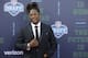 Central Florida's Shaquem Griffin poses for photos on the red carpet before the first round of the NFL football draft, Thursday, April 26, 2018, in Arlington, Texas. (AP Photo/Eric Gay)