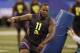 Tennessee defensive lineman Kahlil McKenzie runs a drill during the NFL football scouting combine, Sunday, March 4, 2018, in Indianapolis. (AP Photo/Darron Cummings)