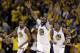 Golden State Warriors' Draymond Green (23) reacts after feeding an alley-oop pass for a dunk by Kevin Durant, left, during the first half in Game 1 of an NBA basketball second-round playoff series Saturday, April 28, 2018, in Oakland, Calif. (AP Photo/Marcio Jose Sanchez)
