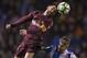 Barcelona's Lionel Messi, left, challenges for the ball with Deportivo's Luisinho during a Spanish La Liga soccer match between Deportivo and Barcelona at the Riazor stadium in A Coruna, Spain, Sunday, April 29, 2018. (AP Photo/Lalo R. Villar)