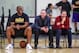 L.A. Lakers assistant general manager Jesse Buss (middle) sitting with Earvin "Magic" Johnson and Joey Buss.