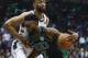 Boston Celtics' Jaylen Brown tries to drive past Milwaukee Bucks' Jabari Parker during the second half of Game 4 of an NBA basketball first-round playoff series Sunday, April 22, 2018, in Milwaukee. The Bucks won 104-102. (AP Photo/Morry Gash)