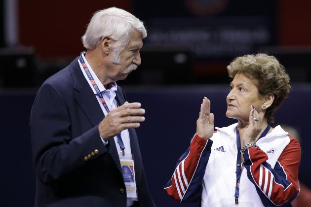 FILE - In this June 29, 2012, file photo, Bela Karolyi, left, and his wife Martha Karolyi talk on the arena floor before the start of the preliminary round of the women's Olympic gymnastics trials in San Jose, Calif. The latest lawsuit filed Thursday, Oct. 27, 2016, accusing Dr. Larry Nassar, a former USA Gymnastics doctor, of sexually abusing a longtime member of the U.S. women's national team is the first to name renowned husband-and-wife coaches Bela and Martha Karolyi, alleging they turned a blind eye to molestations. The Karolyis did not return messages seeking comment. (AP Photo/Gregory Bull, File)