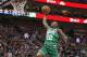 Boston Celtics guard Terry Rozier (12) goes to the basket in the second half during an NBA basketball game against the Utah Jazz Wednesday, March 28, 2018, in Salt Lake City. (AP Photo/Rick Bowmer)