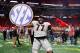 ATLANTA, GA - DECEMBER 02: Isaiah Wynn #77 of the Georgia Bulldogs celebrates beating the Auburn Tigers in the SEC Championship at Mercedes-Benz Stadium on December 2, 2017 in Atlanta, Georgia. (Photo by Kevin C. Cox/Getty Images)