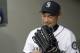 Seattle Mariners' Ichiro Suzuki stands in the dugout before a baseball game against the Oakland Athletics Wednesday, May 2, 2018, in Seattle. (AP Photo/Elaine Thompson)