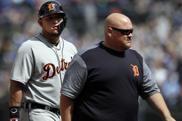 Detroit Tigers designated hitter Miguel Cabrera, left,  leaves with injury during the sixth inning of a baseball game against the Kansas City Royals at Kauffman Stadium in Kansas City, Mo., Thursday, May 3, 2018. (AP Photo/Orlin Wagner)