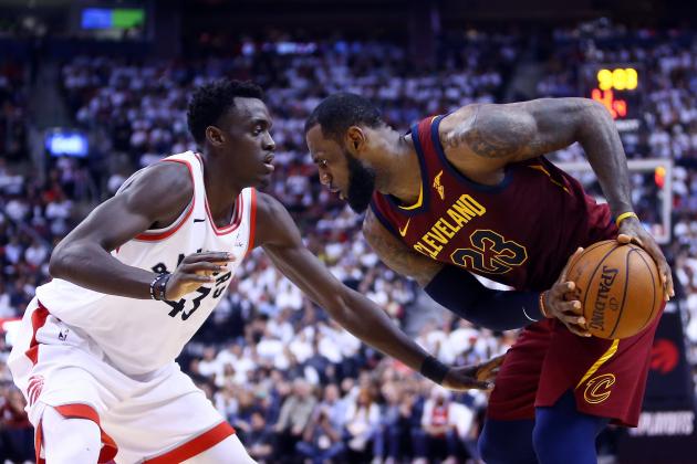 TORONTO, ON - MAY 03:  LeBron James #23 of the Cleveland Cavaliers dribbles the ball as Pascal Siakam #43 of the Toronto Raptors defends in the second half of Game Two of the Eastern Conference Semifinals during the 2018 NBA Playoffs at Air Canada Centre on May 3, 2018 in Toronto, Canada.  NOTE TO USER: User expressly acknowledges and agrees that, by downloading and or using this photograph, User is consenting to the terms and conditions of the Getty Images License Agreement.  (Photo by Vaughn Ridley/Getty Images)