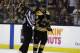 In this May 2, 2018 photo, Boston Bruins left wing Brad Marchand (63) is escorted to the penalty box during the second period of Game 3 of an NHL second-round hockey playoff series against the Tampa Bay Lightning in Boston. The NHL has told Marchand to stop licking opponents or the Boston Bruins forward will face punishment. Senior vice president of hockey operations Colin Campbell spoke to Marchand and Bruins general manager Don Sweeney on Saturday, May 5 about his actions Friday night against Tampa Bay. Marchand licked Lightning forward Ryan Callahan during Game 4 of their second-round series after appearing to do the same to Toronto’s Leo Komarov earlier in the playoffs. (AP Photo/Charles Krupa)